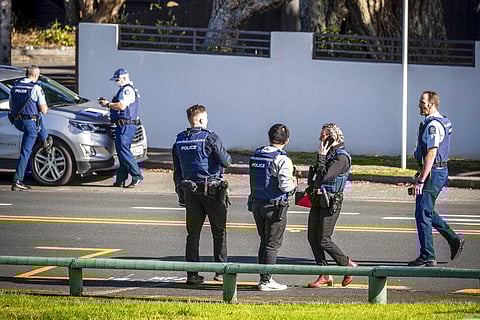Police set up cordons and search area around a suburb of Auckland following reports of multiple stabbings, in New Zealand. (Photo | AP)