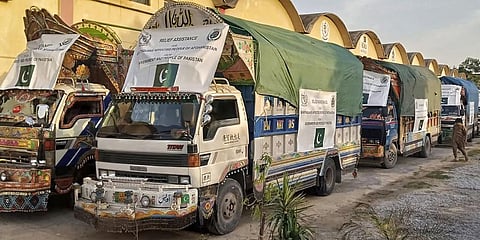 Trucks carrying relief goods and emergency medicines for Afghanistan's earthquake hit areas, prepare to leave from a warehouse in Islamabad, Pakistan.(Photo | AP)