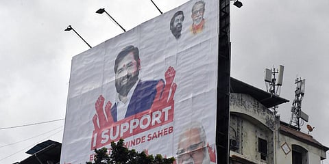 Hoarding put up in support of rebel Shiv Sena leader Eknath Shinde, in Thane. (Photo| ANII)