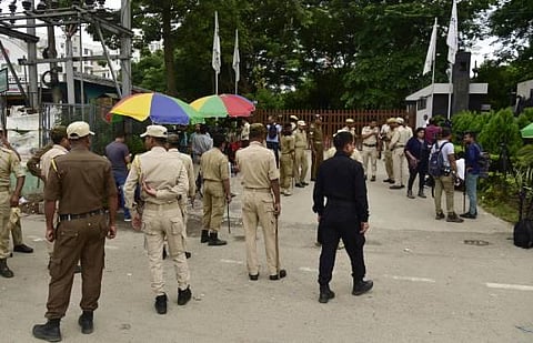 Security personnel stand guard at the main entrance of the hotel where rebel Shiv Sena MLAs are staying, in Guwahati. (Photo | PTI)