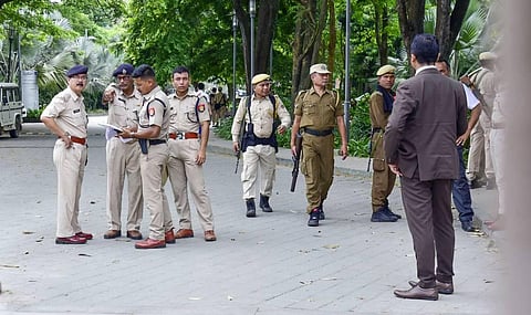 Security personnel stand guard at Radisson Blu Hotel, where rebel Shiv Sena leader Eknath Shinde and other supporting MLAs are staying, in Guwahati. (Photo | PTI)