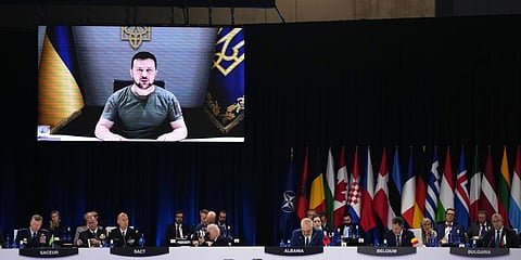 Zelenskyy addresses leaders via a video screen during a round table meeting at a NATO summit in Madrid, Spain on Wednesday, June 29, 2022. (Photo | AP)