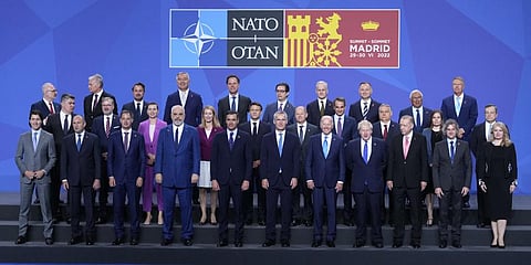 NATO leaders pose for a group photo following the official welcome for the NATO summit in Madrid, Spain, on Wednesday, June 29.(Photo | AP)