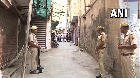 Teams of Police, NIA, SIT, FSL and ATS reach the spot in Udaipur. (Photo | ANI Twitter)