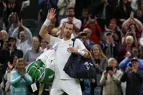 Britain's Andy Murray waves after losing the singles tennis match against John Isner of the US on day three of the Wimbledon tennis championships in London. (Photo | AP)