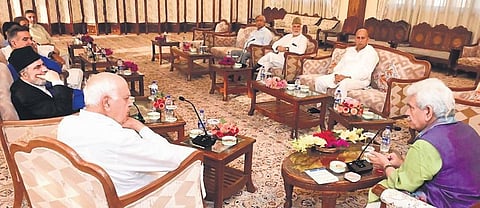 Farooq Abdullah and other J&K leaders at a meeting convened by Lt-Gov | Express