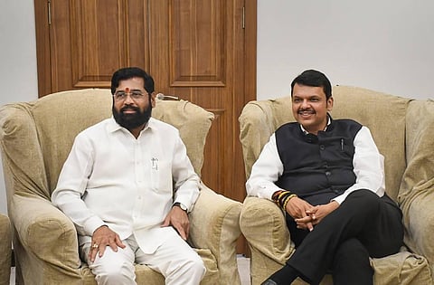 Rebel Shiv Sena leader Eknath Shinde meets BJP leader and former Maharashtra Governor Devendra Fadnavis at his residence, in Mumbai. (Photo | PTI)