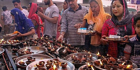 Kashmiri Pandits offer prayers at the replica of Kheer Bhawani temple. (File Photo| PTI)