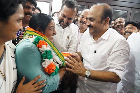 V D Satheesan greets Uma Thomas after election result was announced | Express