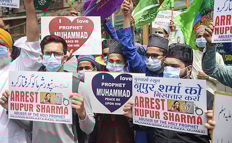 Activists shout slogans as they react to remarks of suspended BJP leader Nupur Sharma on Prophet Muhammad during a protest in Mumbai. (Photo | PTI)