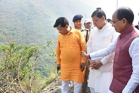 Uttarakhand CM Pushkar Singh Dhami with Madhya Pradesh CM Shivraj Singh Chouhan visits the site of a bus accident in Damta area of Uttarkashi. (Photo | PTI)