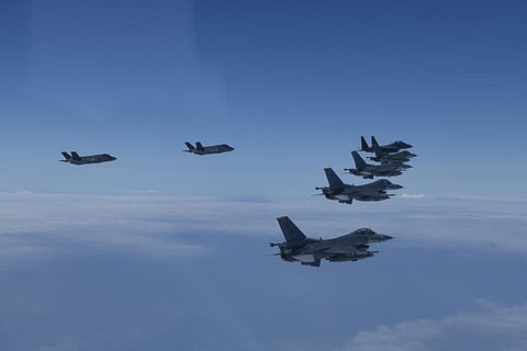 U.S. and South Korea Air Force fighter jets fly in formation during a joint drill. (File Photo | AP)
