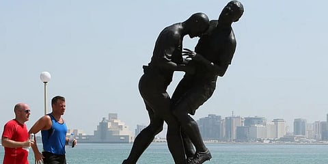 French legend Zinedine Zidane's notorious 2006 World Cup final headbutt Italian defender Marco Materazzi on display. (Photo | AFP)