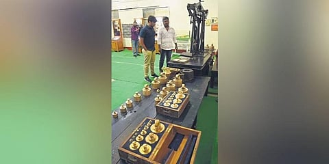 Visitors browse through the display of old coins at the Saifabad mint museum in Hyderabad, on Tuesday | RVK Rao