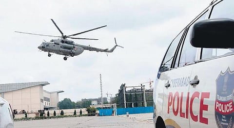An Indian Air Force chopper lands at the HICC on Thursday ahead of the BJP’s national executive meetings. (Photo | RVK Rao, EPS)