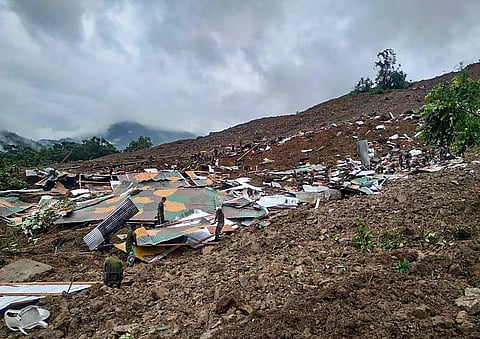 Rescue operations underway after a massive landslide hit the Tupul railway construction camp in Noney district of Manipur. (Photo | PTI)