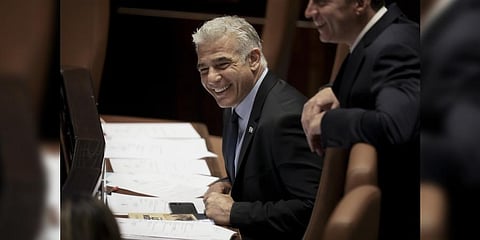 Yair Lapid will serve as caretaker prime minister until elections this fall. It would be Israel's fifth election in under four years.(Photo | AP)