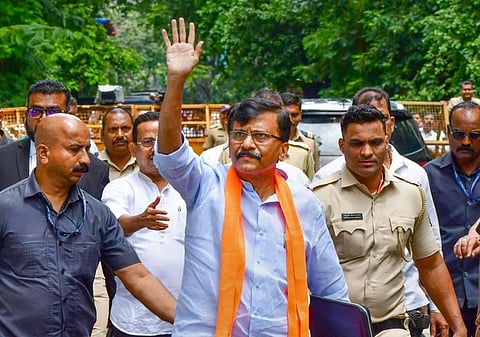 Shiv Sena leader Sanjay Raut arrives at the Enforcement Directorate office for questioning in an alleged money laundering case linked to the redevelopment of Patra Chawl, in Mumbai. (Photo | PTI)
