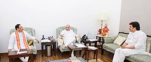 Union Home Minister Amit Shah and BJP National President J.P. Nadda with expelled Congress leader Kuldeep Bishnoi during their meeting in New Delhi. (Photo | PTI)