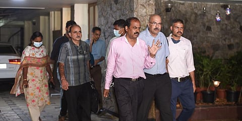 Officers of Central Bureau of Investigation (CBI) leave after conducting a raid at the residence of Congress leader Karti Chidambaram in connection with Chinese visa case. (Photo | PTI)