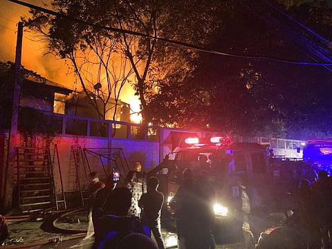 Firefighters try to douse a fire at the Sri Lankan prime minister Ranil Wickremesinghe's private residence, in Colombo, Sri Lanka, on July, 9, 2022. (Photo | AP)