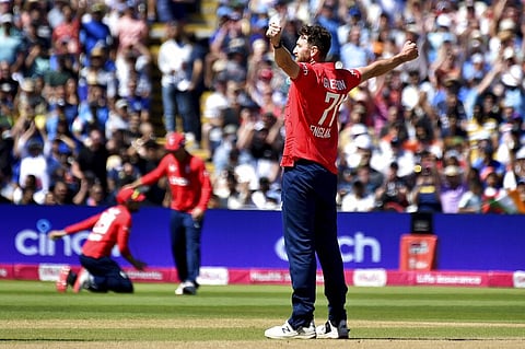 England's Richard Gleeson, celebrates after dismissing India's Virat Kholi during the second T20 international cricket match between England and India. (Photo | AP)