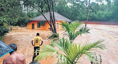 A house inundated by gushing floodwaters following heavy rain that continued to pound Kodagu. (Photo| EPS)