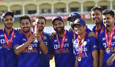 India players celebrate with trophy after winning the series against England after the third T20 international cricket match. (Photo | AP)
