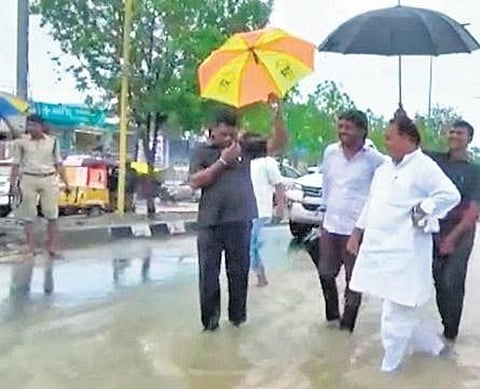 Minister A Indrakaran Reddy inspects the flooded areas in Nirmal on Sunday. (Photo | Express)