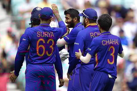 India's Jasprit Bumrah, center, celebrates with teammates the dismissal of England's Joe Root during the first one day international cricket match. (Photo | AP)