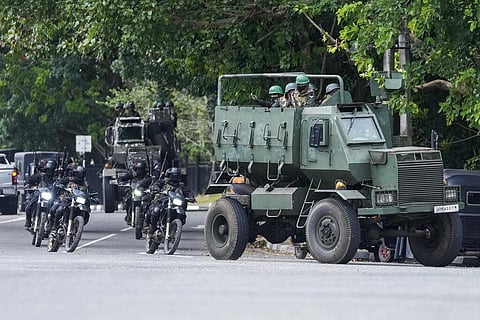 Special force soldiers patrol a road that leads to the parliament in Colombo, Sri Lanka, Thursday, July 14, 2022. (Photo | AP)