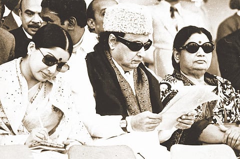A file photo of J Jayalalithaa, MG Ramachandran, and his wife Janaki. ( Express Archives)