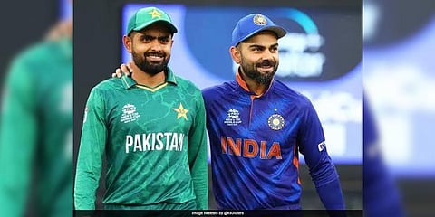 Pakistan's skipper Babar Azam (L) with Virat Kohli.