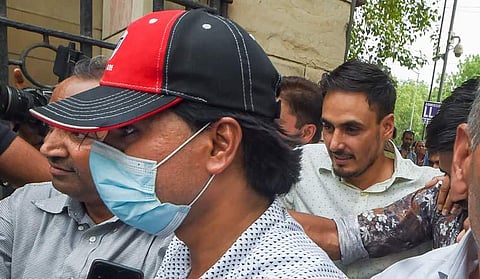 AltNews co-founder Muhammad Zubair being taken to court. (Photo | PTI)