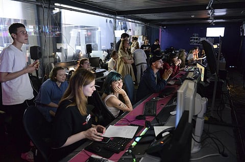 Journalists work in a news room of the Dozhd (Rain) TV channel in Moscow, Russia. (Photo | AP)