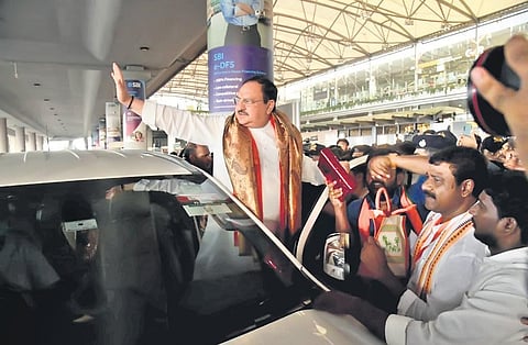 BJP national president JP Nadda waves at followers at the Hyderabad International Airport on Friday. (Photo | Vinay Madapu, EPS)