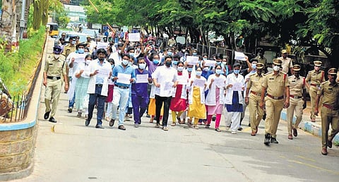 Senior resident doctors of the Gandhi Hospital stage a protest after boycotting emergency services on Friday. (Photo | Vinay Madapu, EPS)