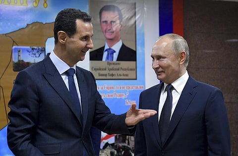 Syrian President Bashar Assad, left, speaking to Russian President Vladimir Putin. (File photo | AP)