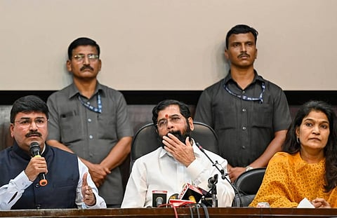 Shiv Sena MP Rahul Shewale speaks as Maharashtra Chief Minister Eknath Shinde and party MP Bhavana Gawali look on during a press conference, at Maharashtra Sadan in New Delhi. (Photo | PTI)