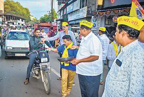 Members of the OBC community distribute sugar to celebrate after SC allowed OBC reservation in local polls in Maharashtra, in Karad on Wednesday. (Photo | PTI)