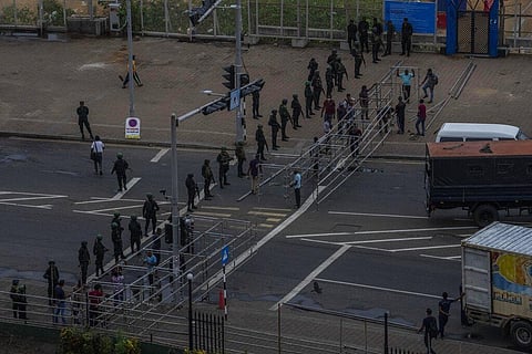 Army soldiers stand guard after removing the protesters and their tents from the site of a protest camp outside the Presidential Secretariat in Colombo, Sri Lanka, Friday(Photo | AP)