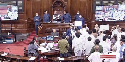 Opposition members protest in the Rajya Sabha during ongoing Monsoon Session of Parliament. (Photo | PTI)