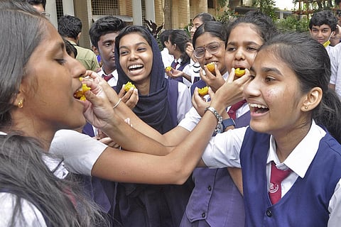 Students celebrating at the Christ Nagar HSS at Kowdiar in Thiruvananthapuram after the Class X CBSE exam results were out on Friday | B P Deepu