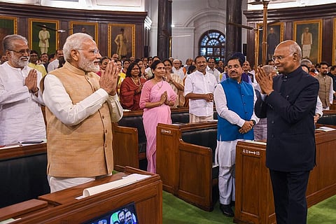 Outgoing President Ram Nath Kovind greets Prime Minister Narendra Modi during the latters farewell function at Parliament House in New Delhi, Saturday. (Photo | PTI)