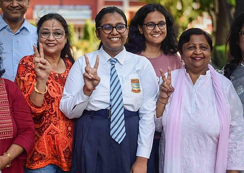 Ananya Agarwal celebrates after the declaration of Indian School Certificate Examinations (ICSE) Class 12th exam results, in Prayagraj, Sunday, July 24, 2022. (Photo | PTI)