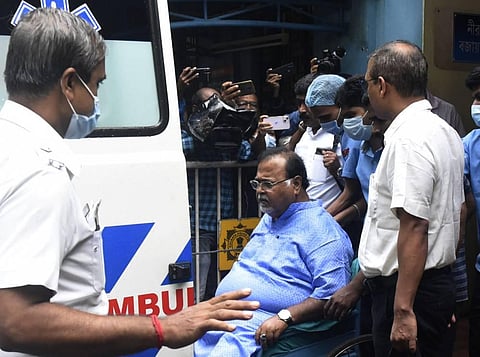 West Bengal Minister Partha Chatterjee (in wheelchair) being shifted to AIIMS Bhubaneswar from SSKM hospital via air ambulance. (Photo | PTI)