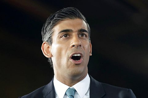 Former Treasury chief Rishi Sunak delivers a speech at Vaculug tyre specialists as part of his campaign. (Photo | AP)