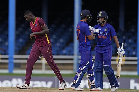 India's Shubman Gill celebrares with Shikhar Dhawan during the third ODI cricket match at Queen's Park Oval in Port of Spain, Wednesday. (Photo |PTI)