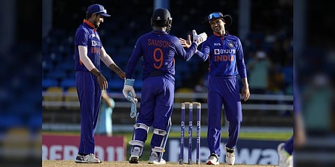 India's captain Shikhar Dhawan, right, celebrates with keeper India's Sanju Samson after winning by 119 runs the third ODI cricket match against West Indies.(Photo | AP)