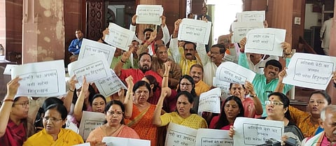 BJP MPs during a protest against Congress leader Adhir Ranjan Chowdhury's remarks on President Droupadi Murmu, at Parliament House, in New Delhi. (Photo | Shekhar Yadav, EPS)